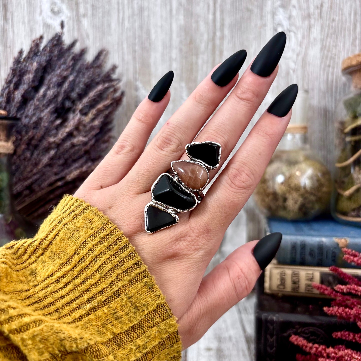 Silver ring featuring black obsidian and sun stone from FOXLARK collection, size 10, with intricate design details.
