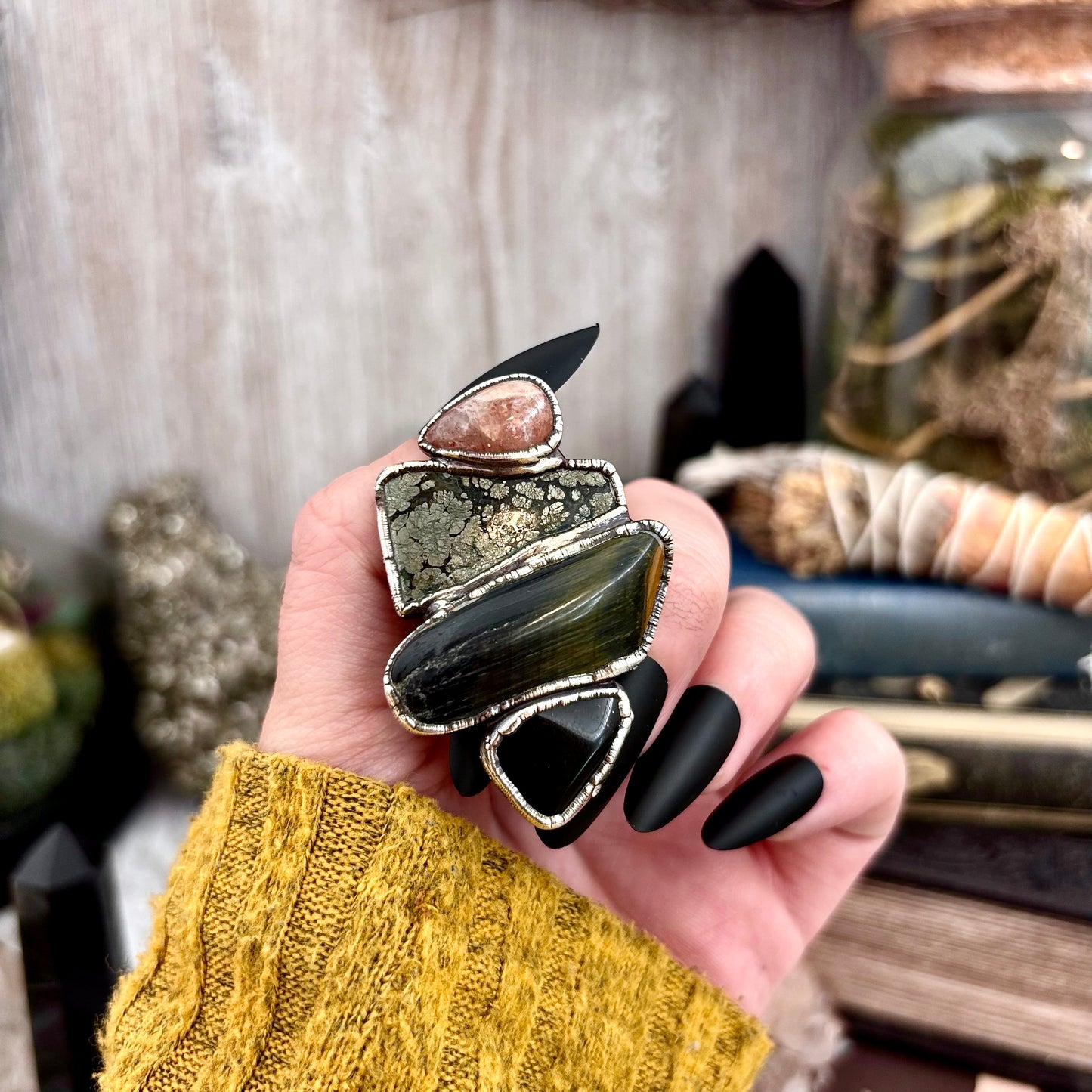 Silver ring featuring multi-stone obsidian, marcasite, blue tiger's eye, and sun stone in size 8 from FOXLARK collection.