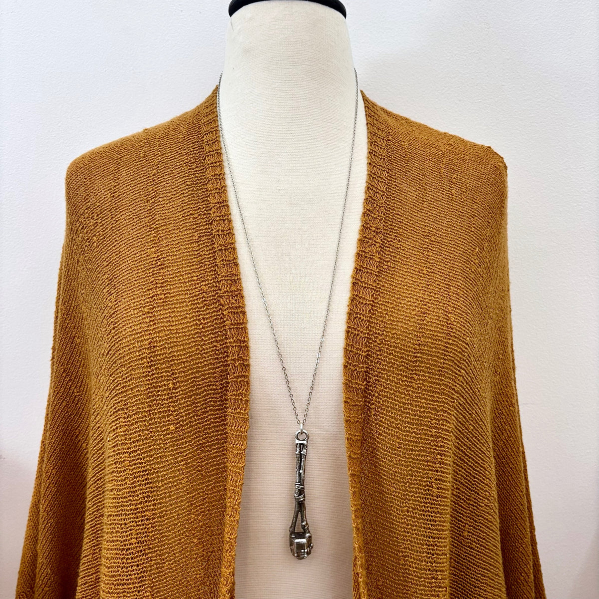 FoXLARK Sticks & Stones Collection garden quartz crystal necklace in silver, featuring a raw crystal pendant on a silver chain.