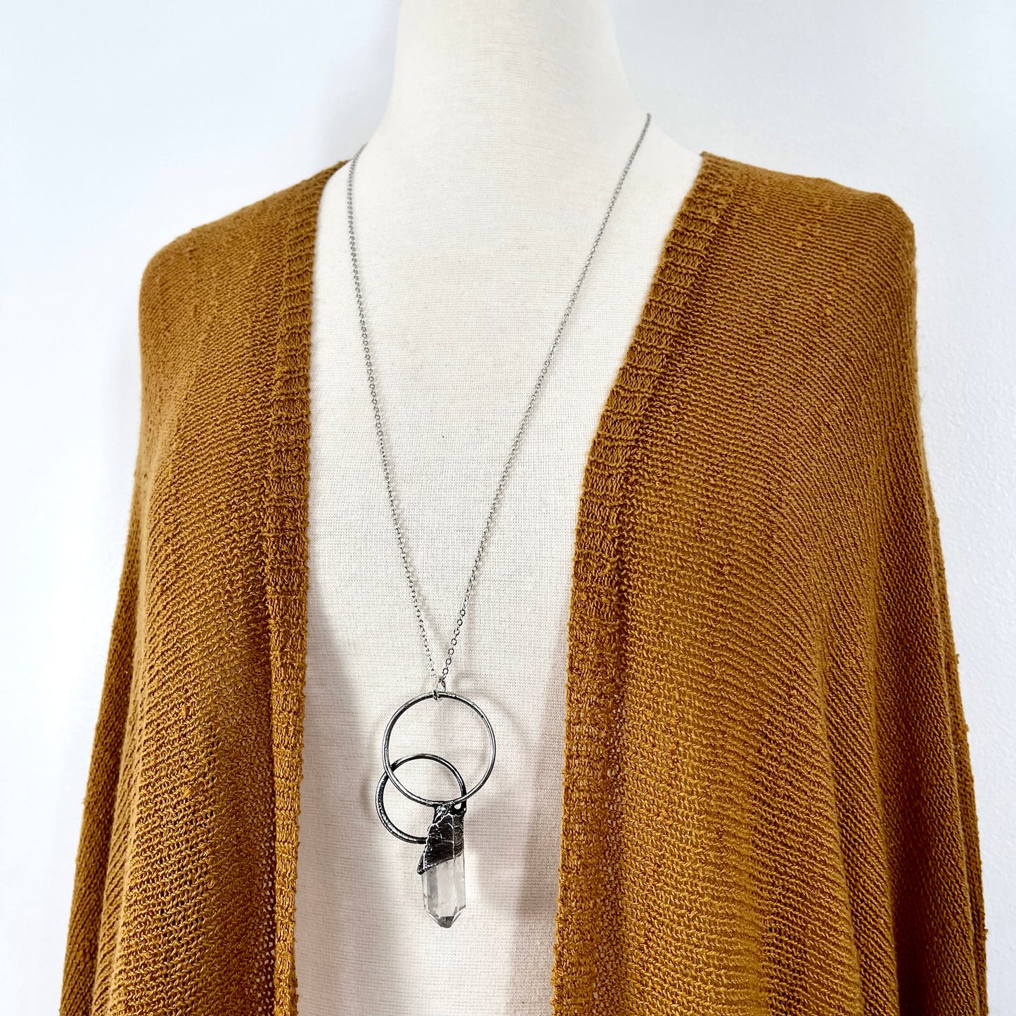 Large clear quartz crystal necklace by FOXLARK featuring a fine silver chain, showcasing a one-of-a-kind gemstone pendant.