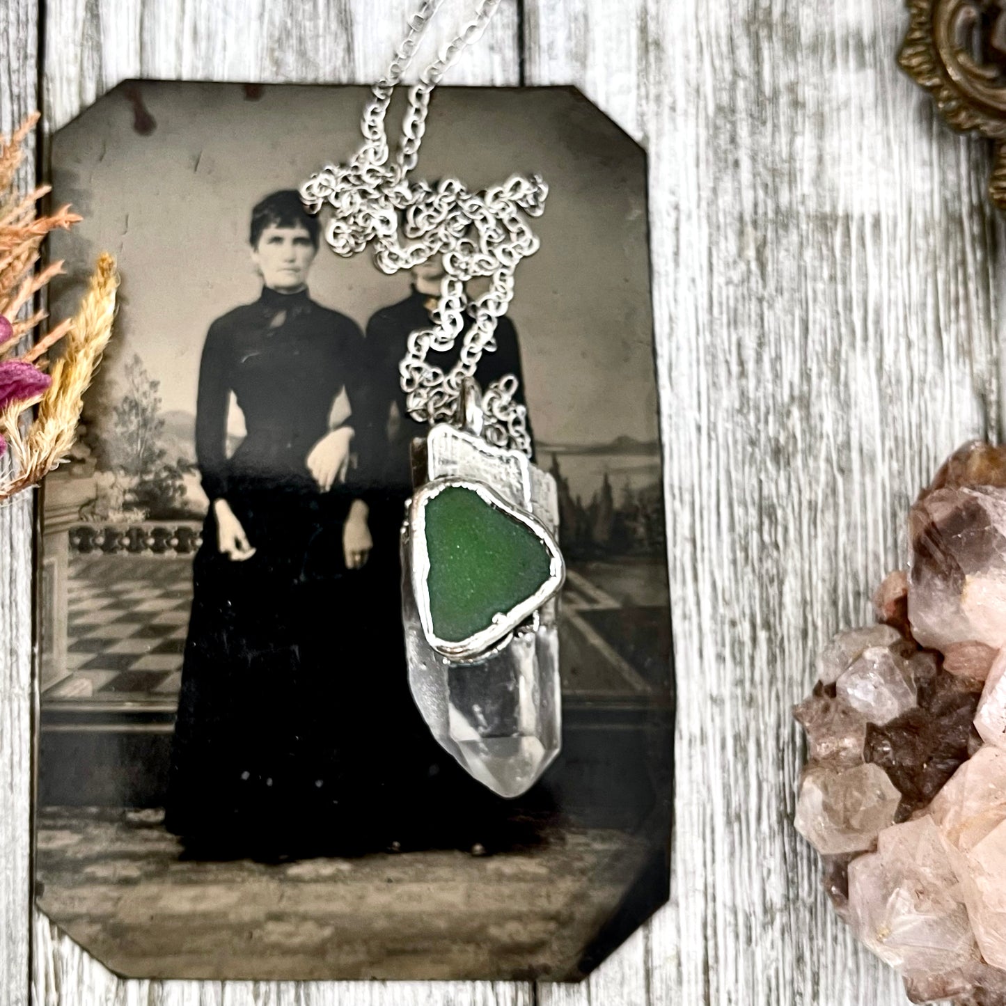 One-of-a-kind Foxlark Clear Quartz and green sea glass crystal statement necklace in fine silver with intricate details.