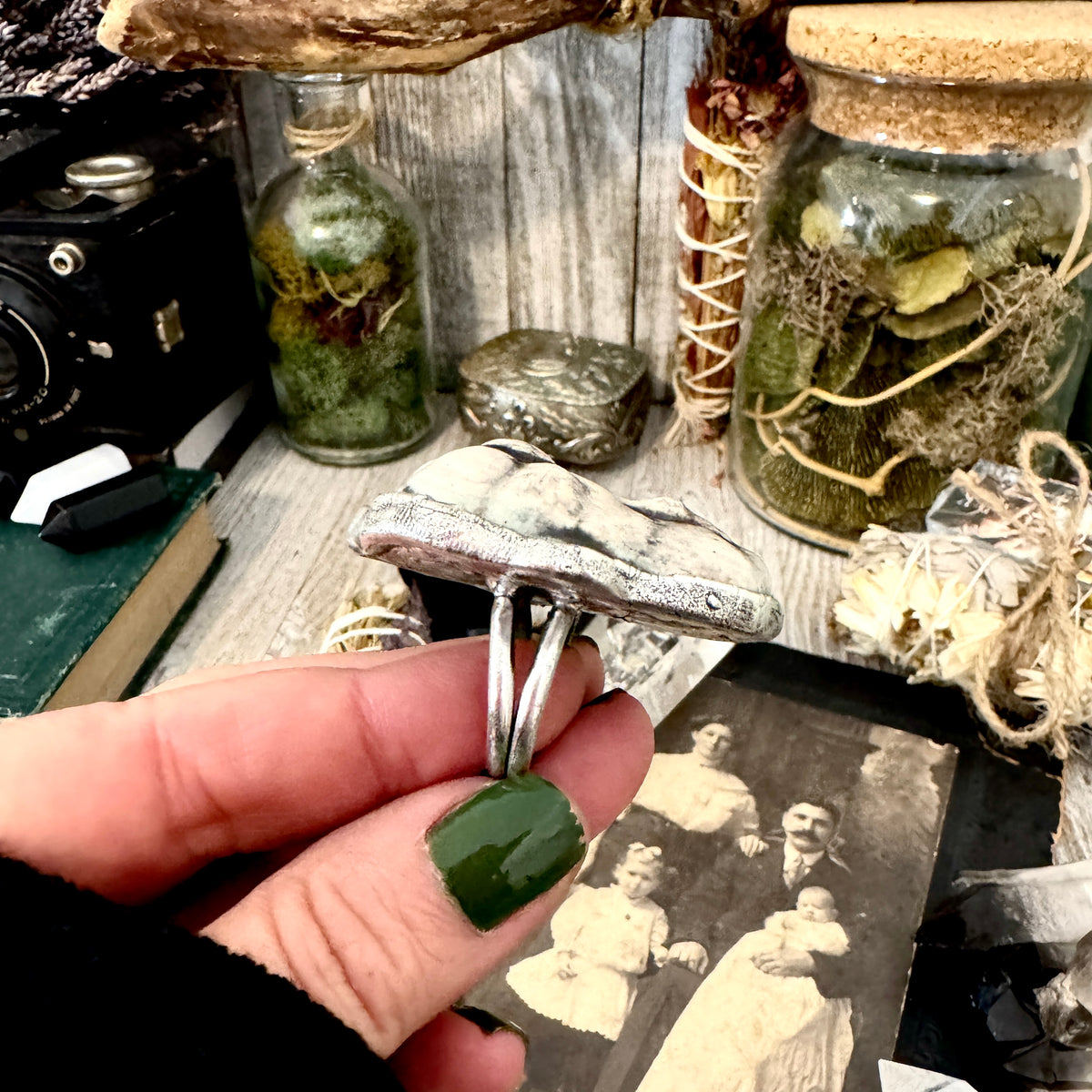 Fine silver ceramic baby doll head ring by FOXLARK, size 7.5, from the Foxlark Collection, featuring detailed craftsmanship.