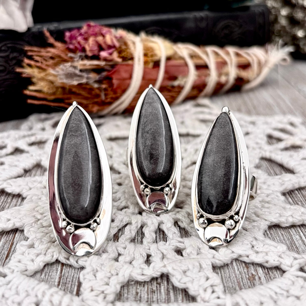 Silver Sheen Obsidian ring by FOXLARK, sterling silver with magic moon design, adjustable size 6-10, featuring a polished obsidian gemstone.