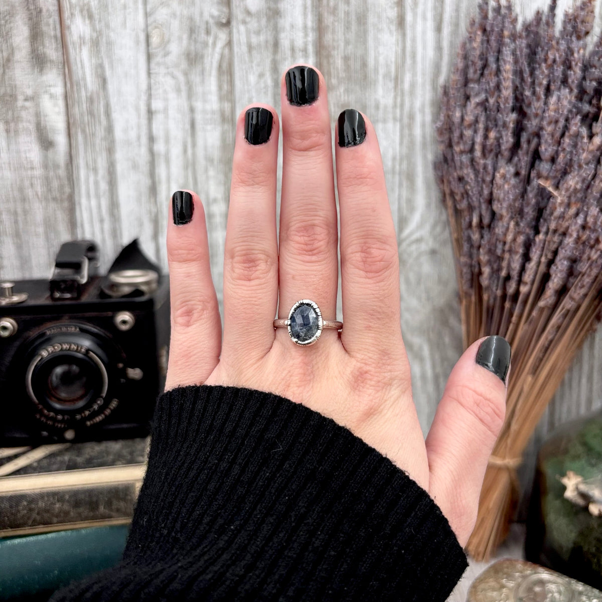 Fine silver sapphire ring with faceted stone, available in sizes 5-11 from FOXLARK's collection, featuring a delicate band and vibrant gemstone.