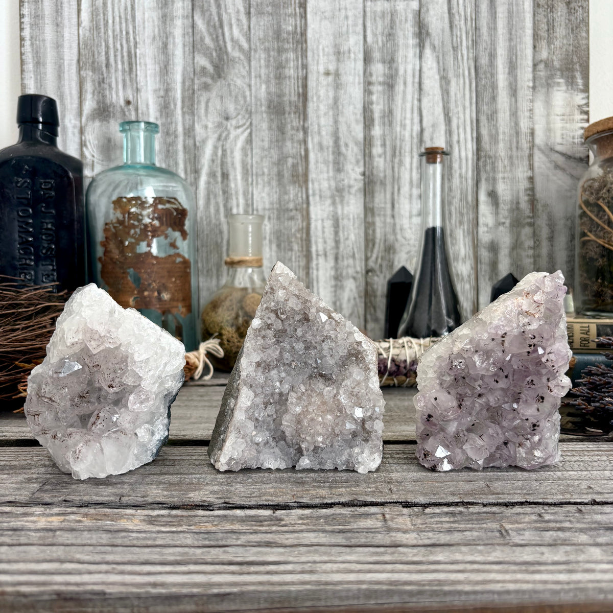 Self-standing amethyst geode crystal cluster from FoxlarkCrystals, showcasing vibrant purple crystals and natural rock formation.