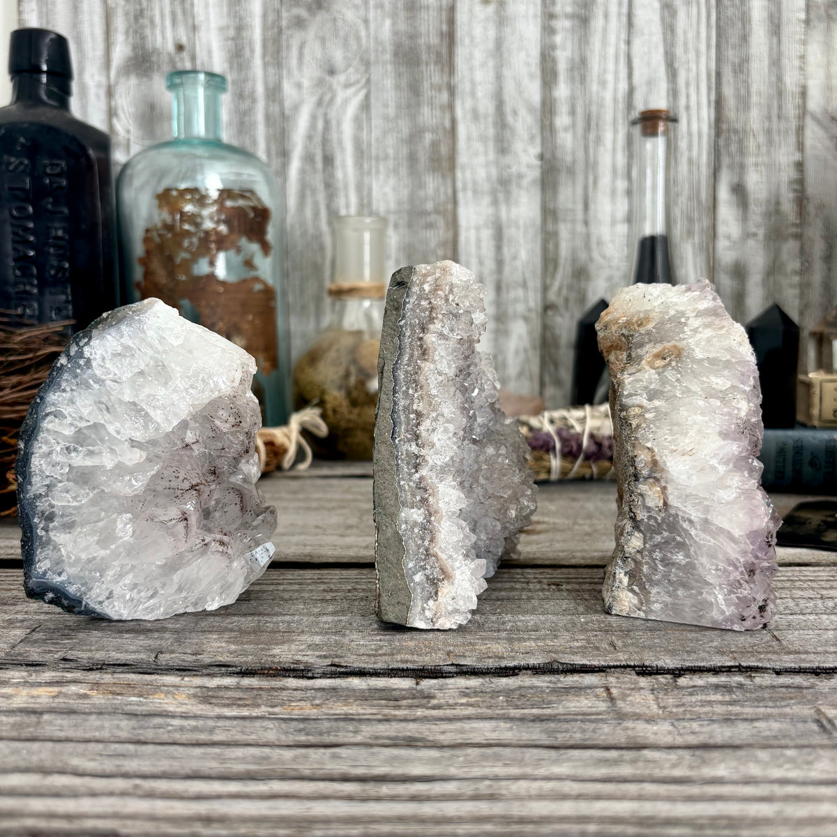 Self-standing amethyst geode crystal cluster from FoxlarkCrystals, showcasing vibrant purple crystals and natural crystalline formations.