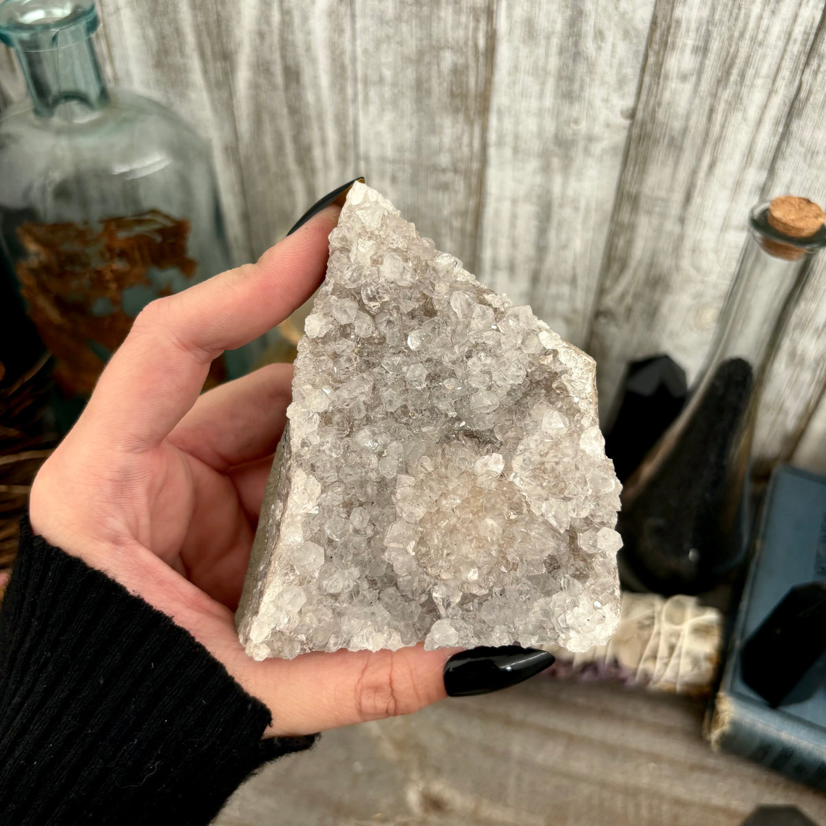 Self-standing amethyst geode crystal cluster from FoxlarkCrystals, showcasing purple crystalline formations and natural rock base.
