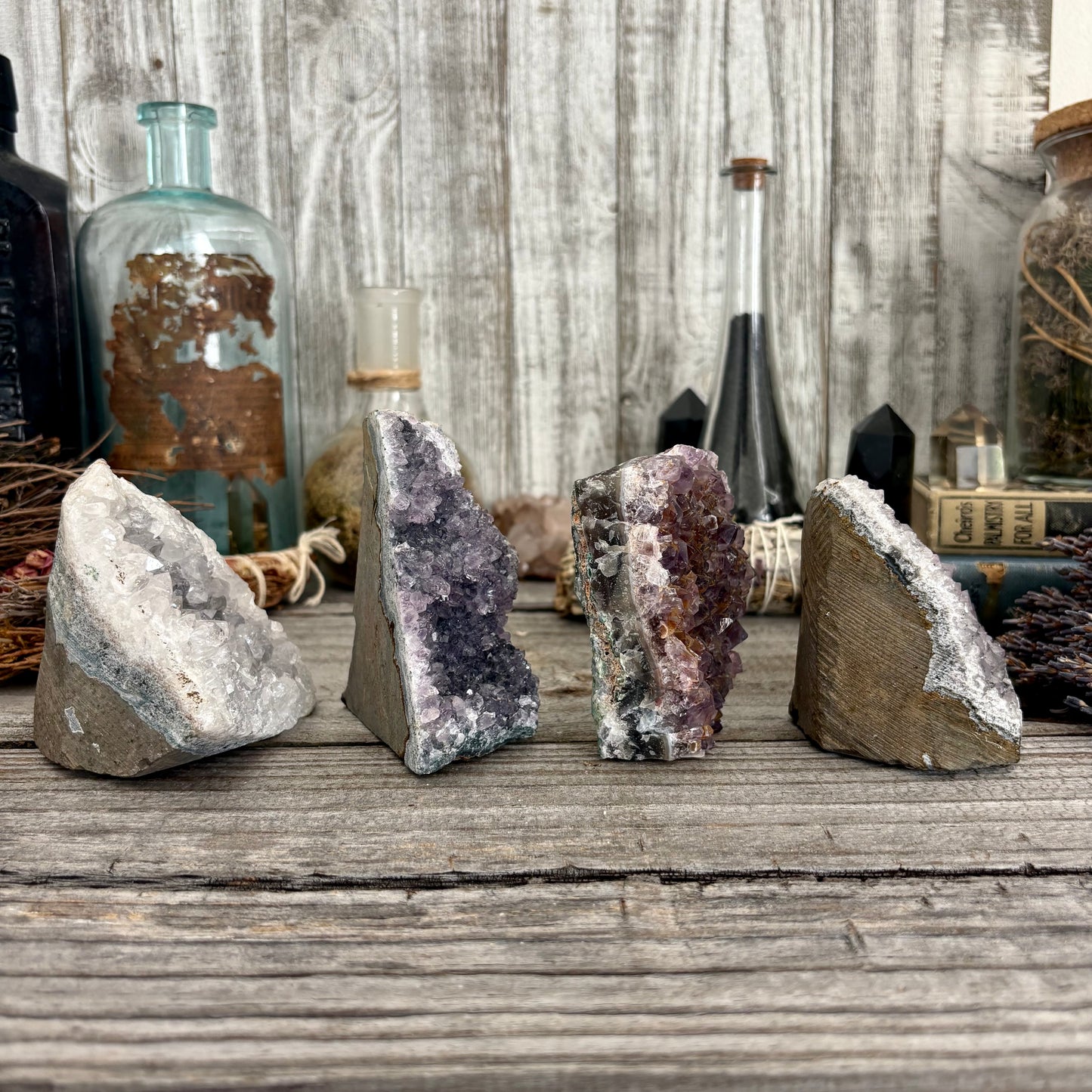 Self-standing amethyst geode crystal cluster from FoxlarkCrystals, showcasing vibrant purple crystals and natural rock formations.