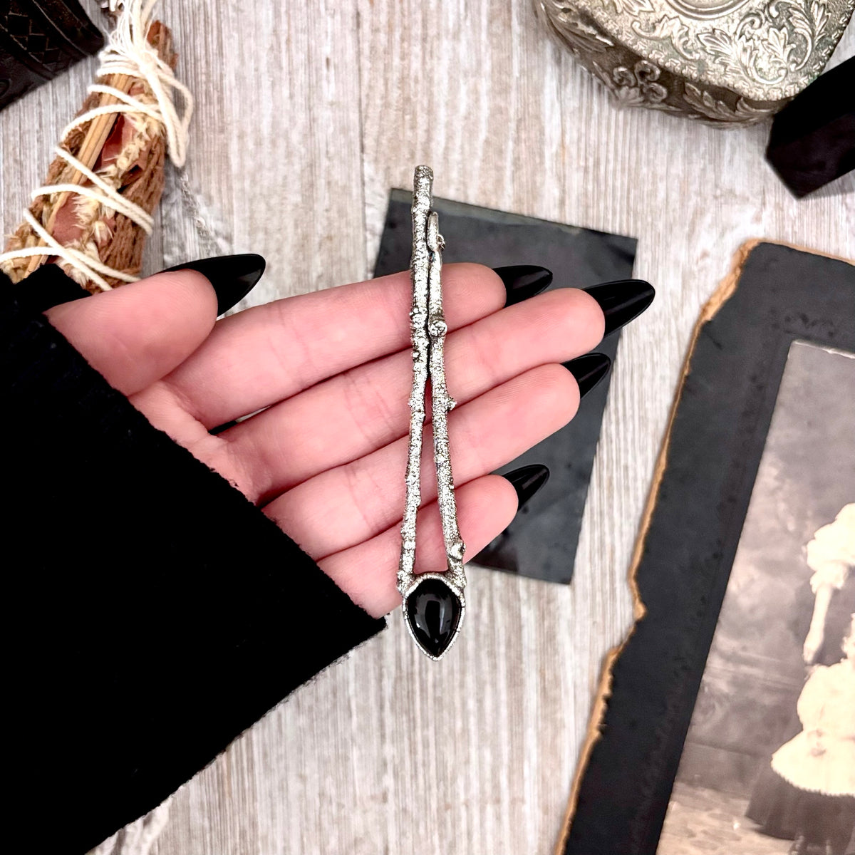 Black Onyx crystal necklace in silver from FOXLARK's Sticks & Stones Collection, featuring a sleek pendant design.