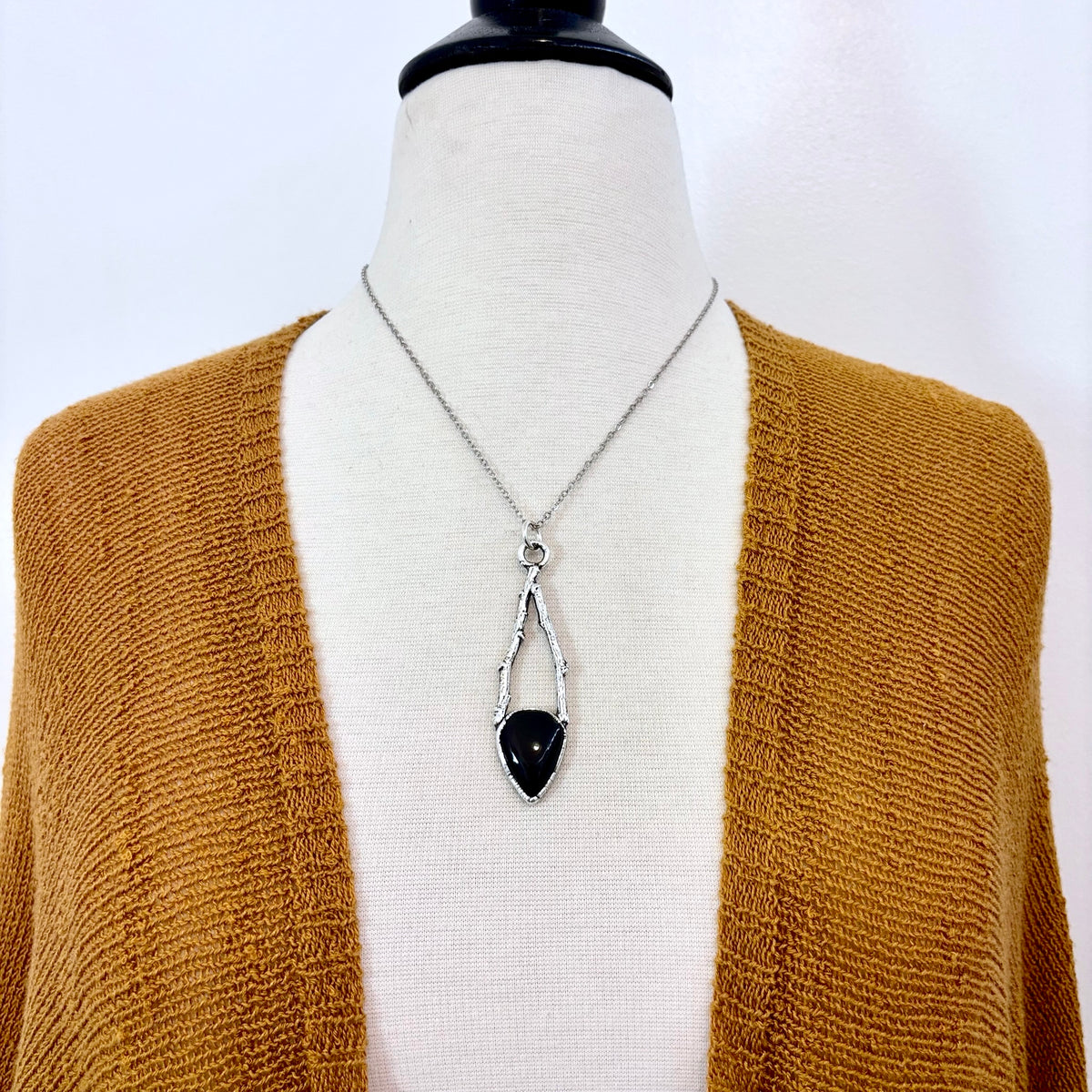 Black onyx crystal necklace by FOXLARK with silver sticks, part of the Sticks & Stones collection, featuring a sleek, elegant design.