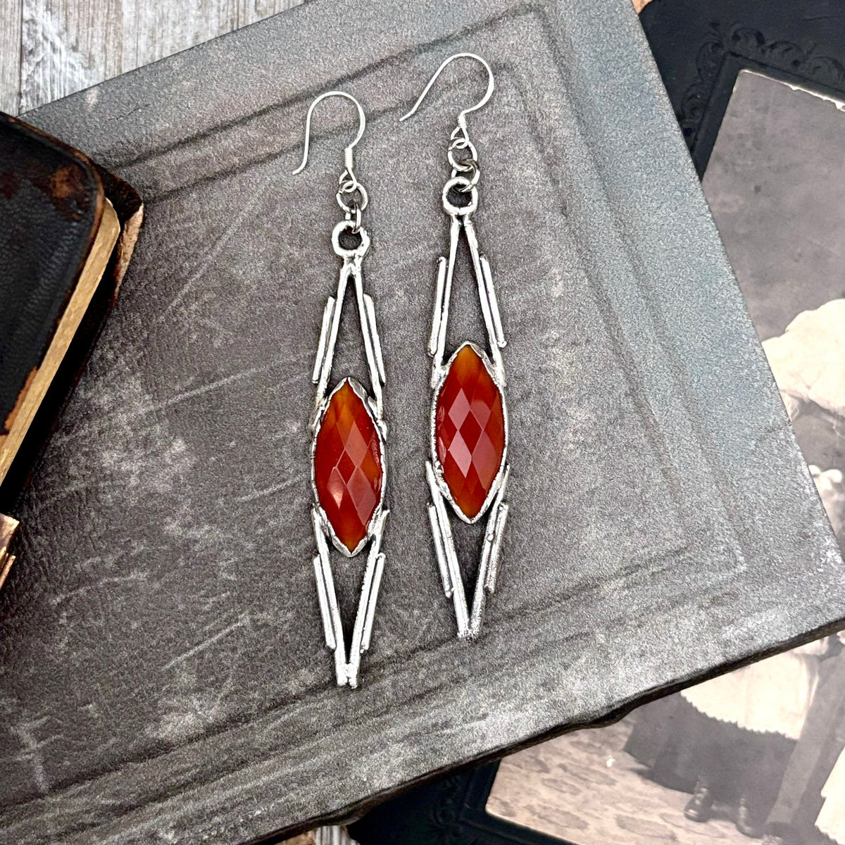 Carnelian and crystal silver dangle earrings by FOXLARK featuring long, witchy-inspired design with intricate silver details.