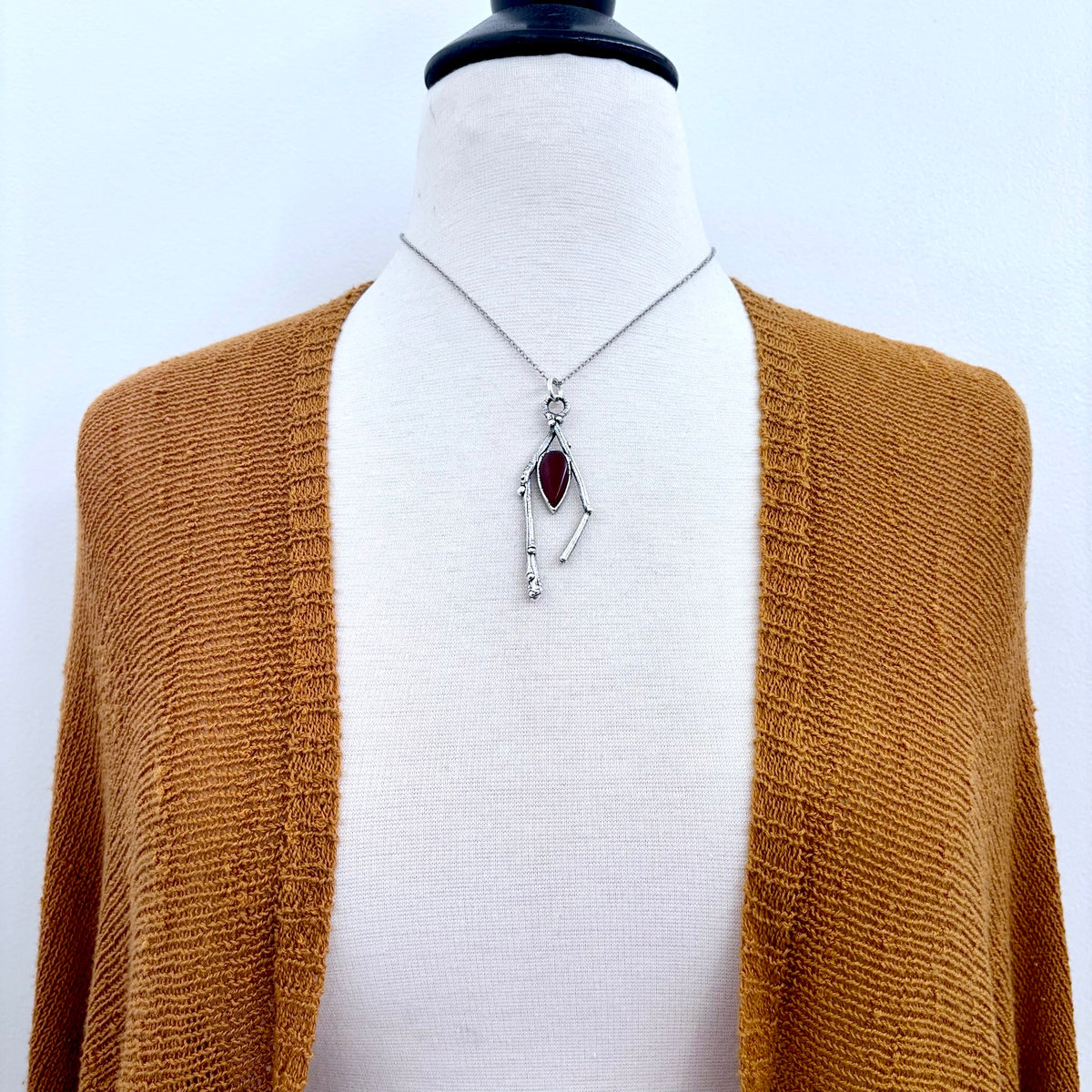 Carnelian crystal necklace with silver sticks, part of FOXLARK's Sticks & Stones collection, featuring a polished orange gemstone pendant.