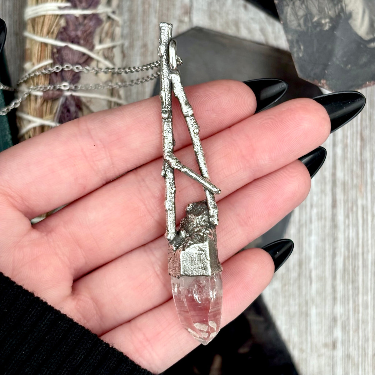 Silver Vera Cruz Amethyst Crystal Necklace from FOXLARK's Sticks & Stones Collection featuring a polished amethyst pendant.