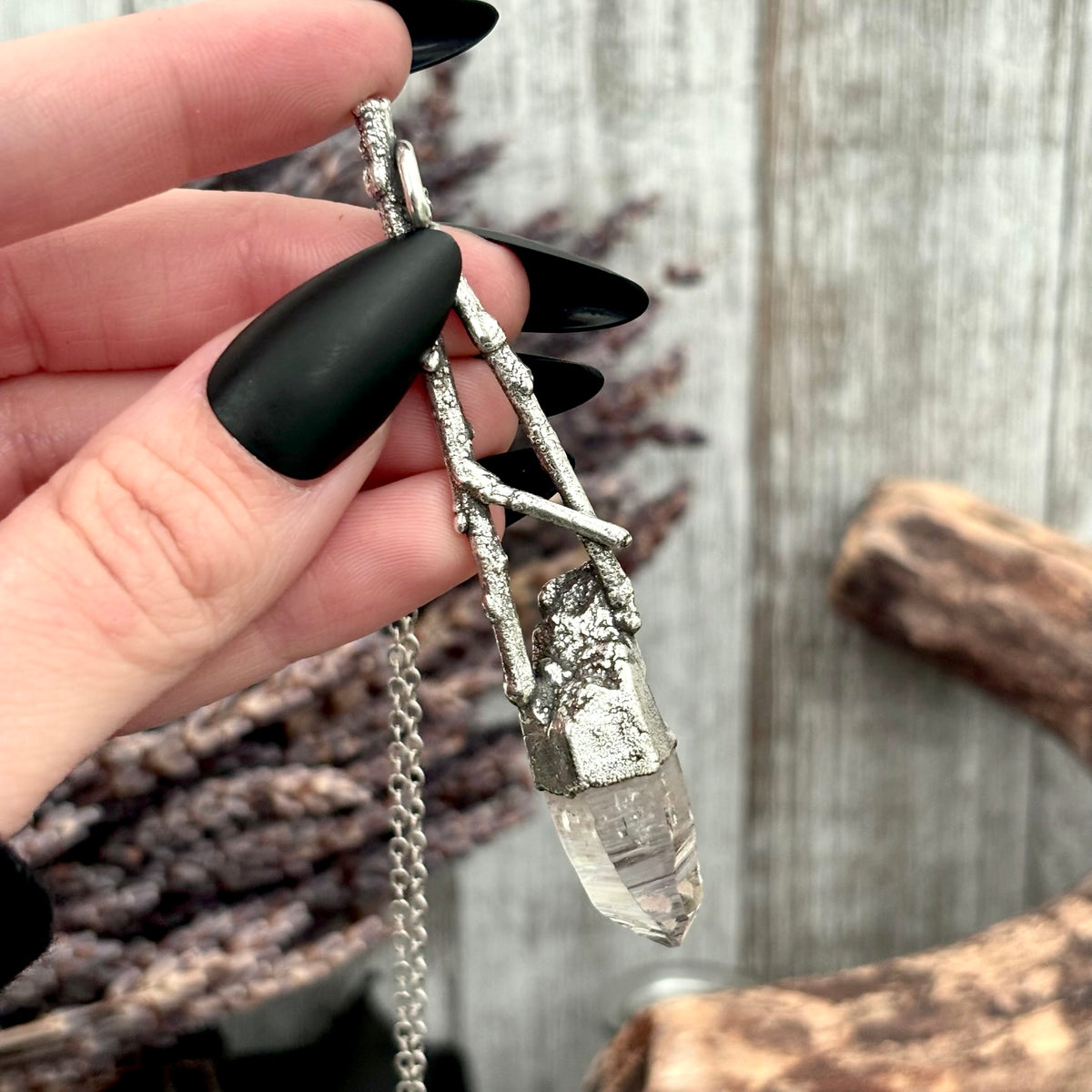 Vera Cruz amethyst crystal necklace by FOXLARK from the Sticks & Stones collection, featuring silver chain and purple gemstone pendant.
