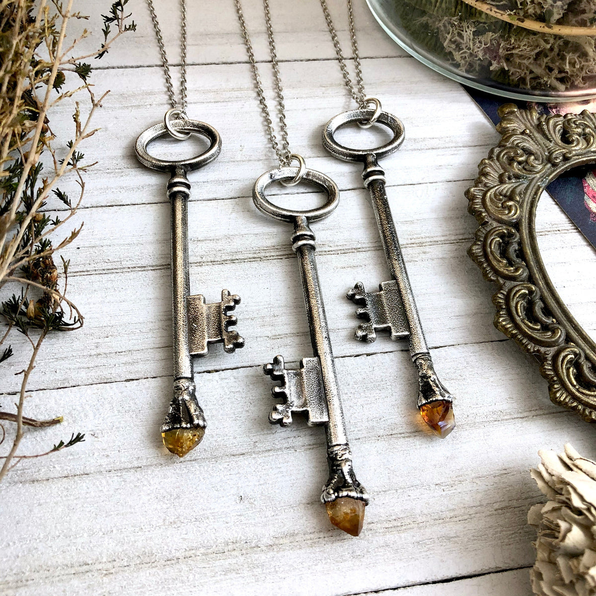 Vintage skeleton key necklace with raw citrine pendant in fine silver from FOXLARK's one-of-a-kind collection.