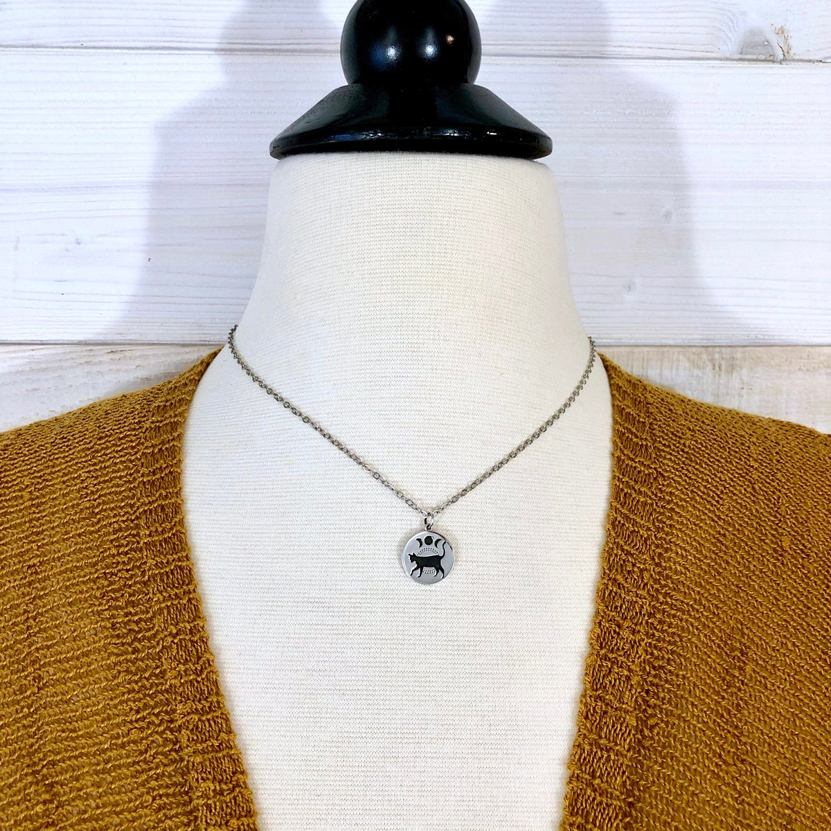 Sterling silver black cat and moon phase necklace pendant from FOXLARK Tiny Talisman Collection, 15mm size.