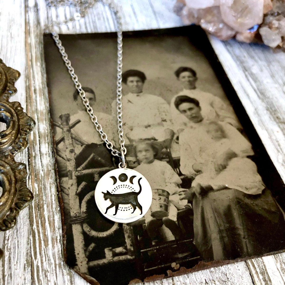 Sterling silver black cat and moon phase necklace pendant from FOXLARK Tiny Talisman Collection, 15mm size.