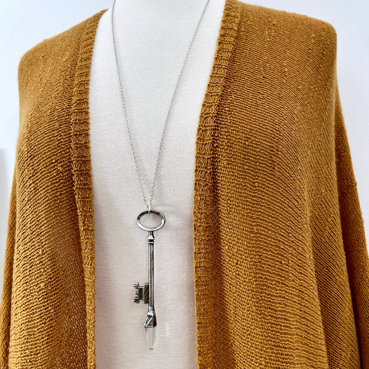 Vintage clear quartz crystal skeleton key necklace pendant in fine silver from FOXLARK, featuring a one-of-a-kind design.