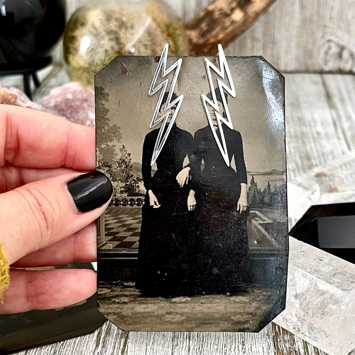 Sterling silver lightning bolt stud earrings set by FOXLARK, featuring sleek, minimalist lightning bolt design in a close-up image.