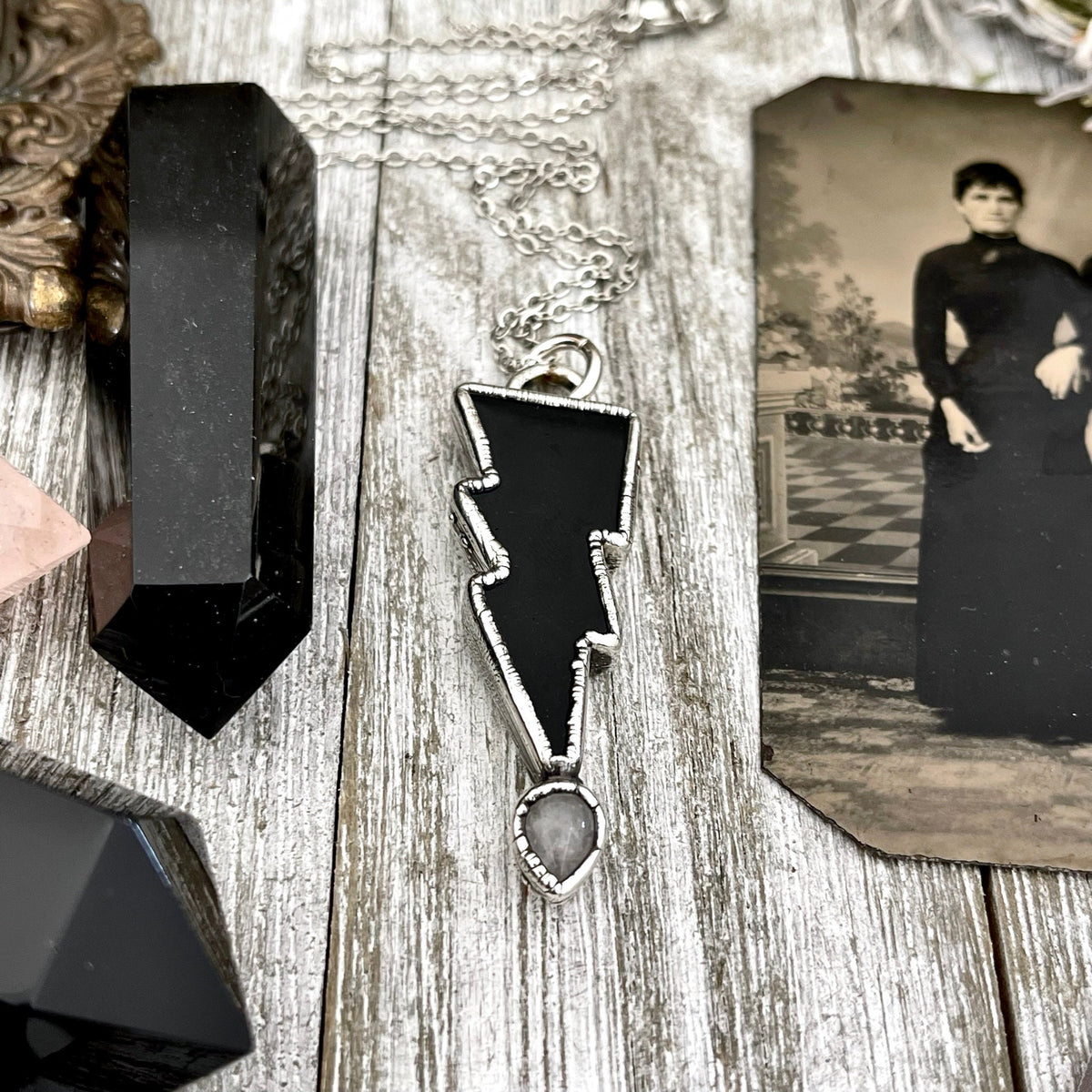 Black onyx and clear quartz crystal lightning bolt pendant necklace by FOXLARK featuring gothic jewelry style.