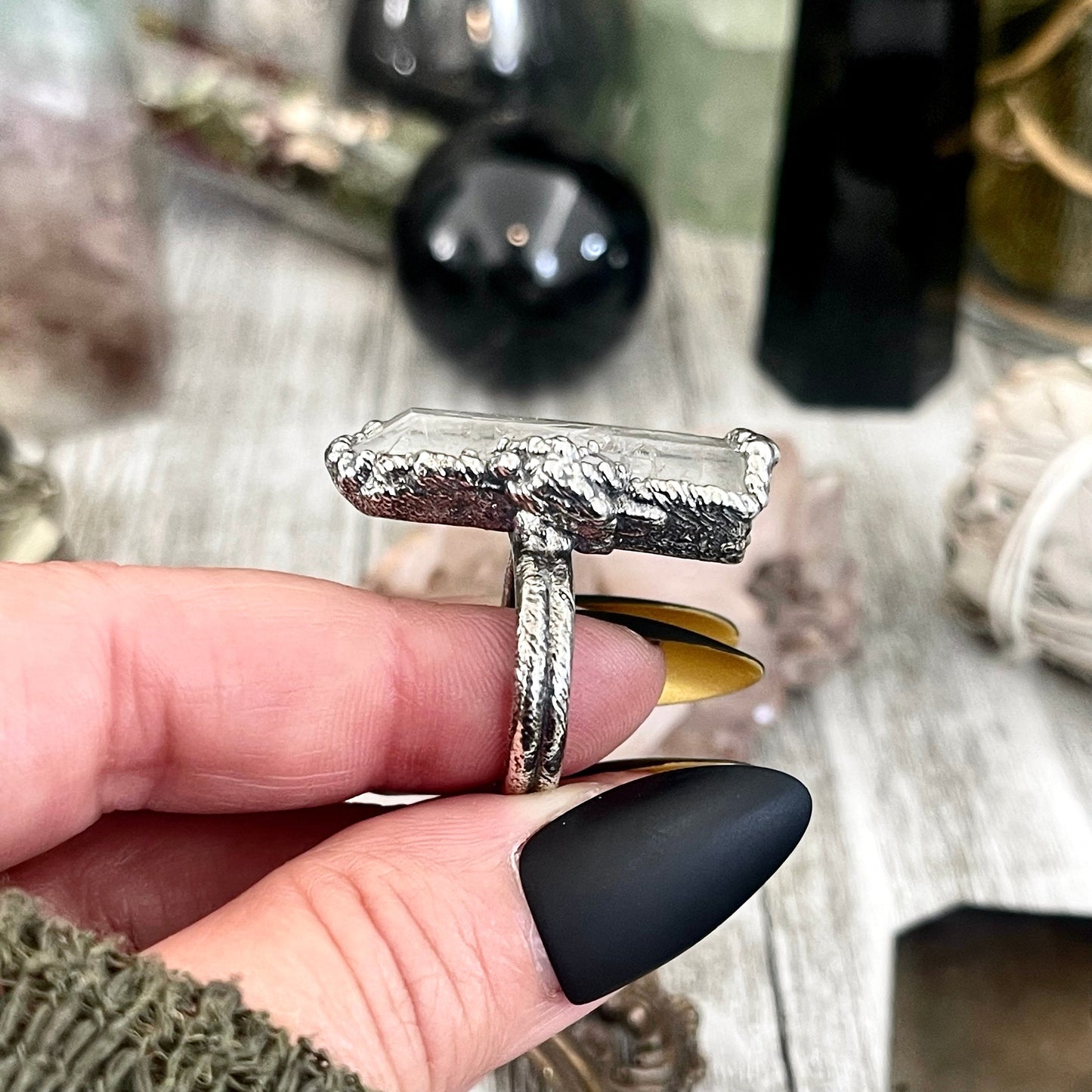 Raw clear quartz crystal point ring set in fine silver by FOXLARK, featuring unique natural quartz points in various sizes.