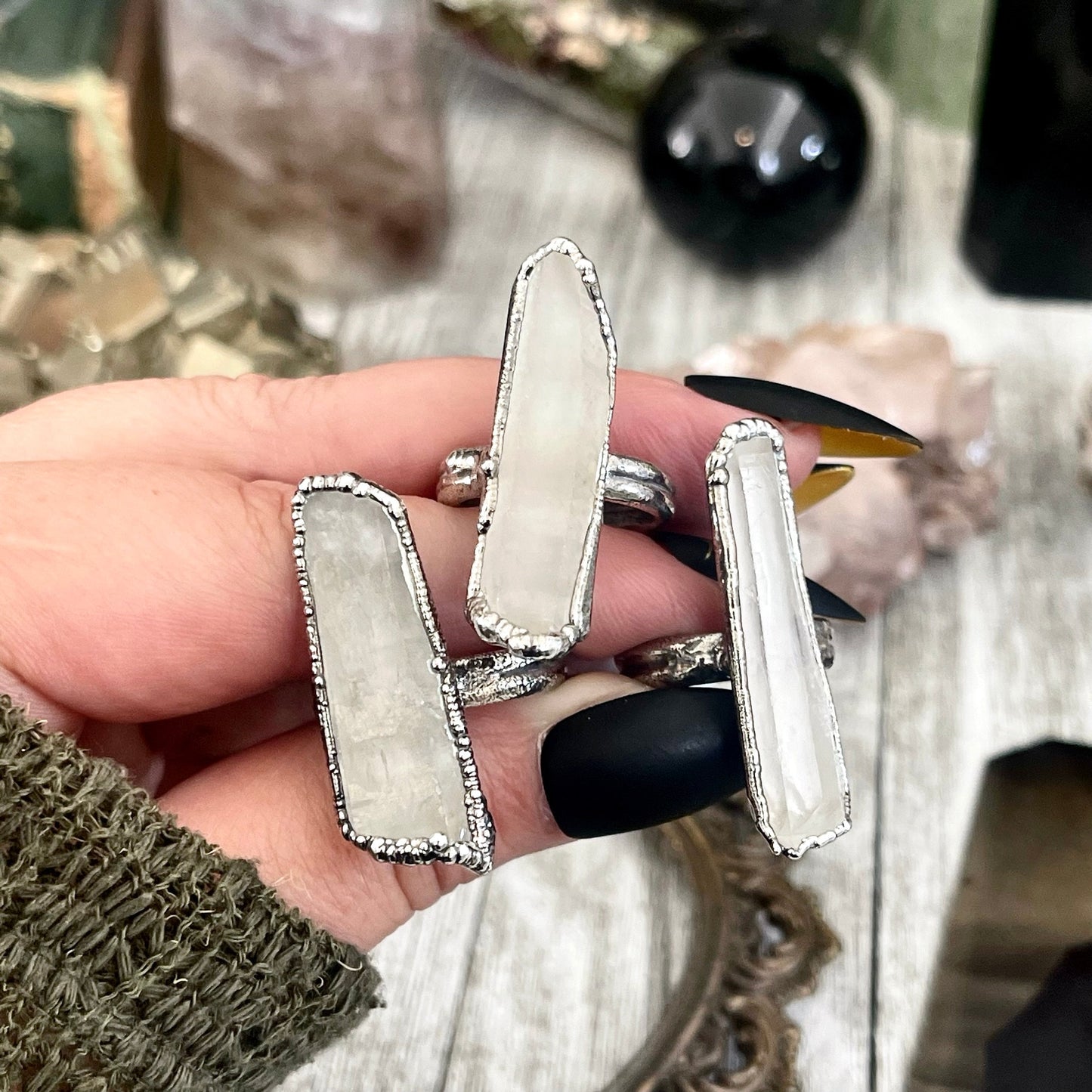 Raw Clear Quartz crystal point ring set in fine silver by FOXLARK, featuring one-of-a-kind designs in sizes 5-9.