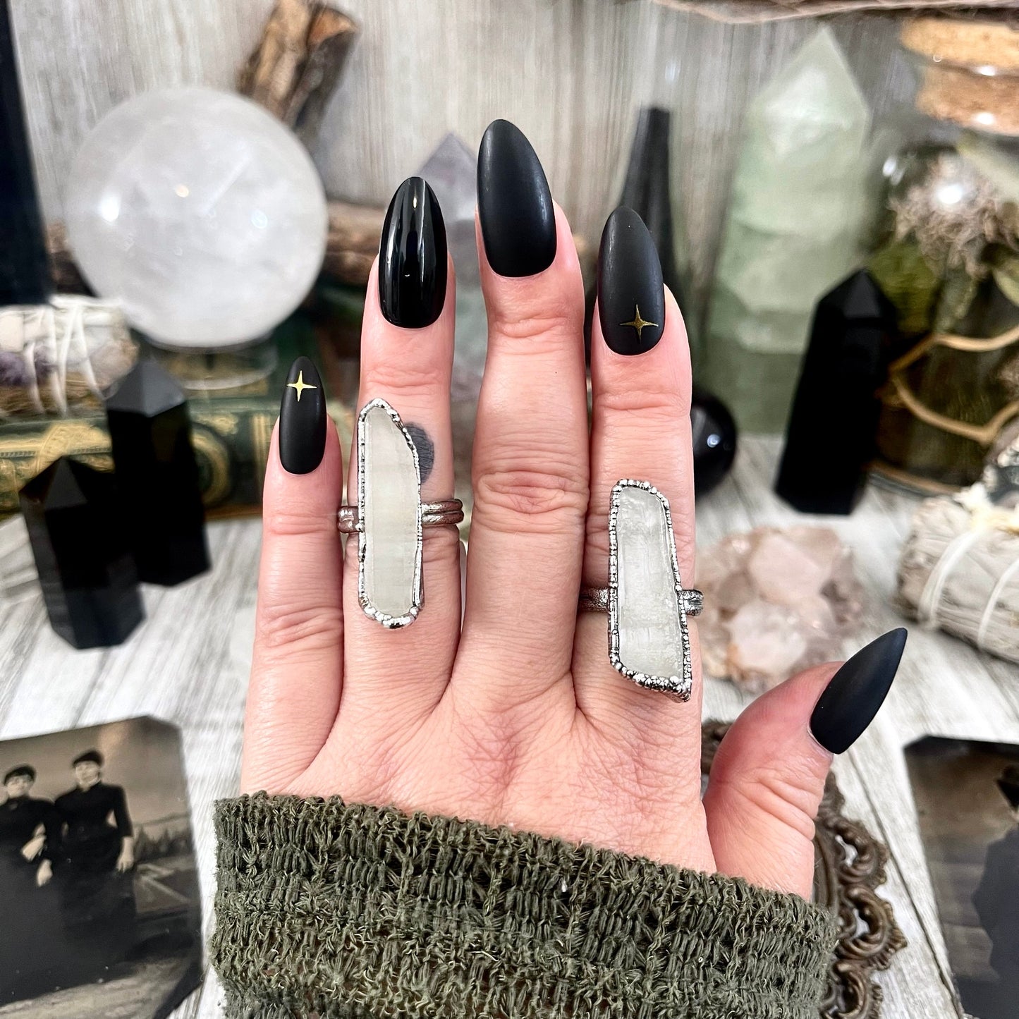 Raw clear quartz crystal point ring set by FOXLARK, featuring fine silver bands in sizes 5 to 9, one-of-a-kind jewelry piece.