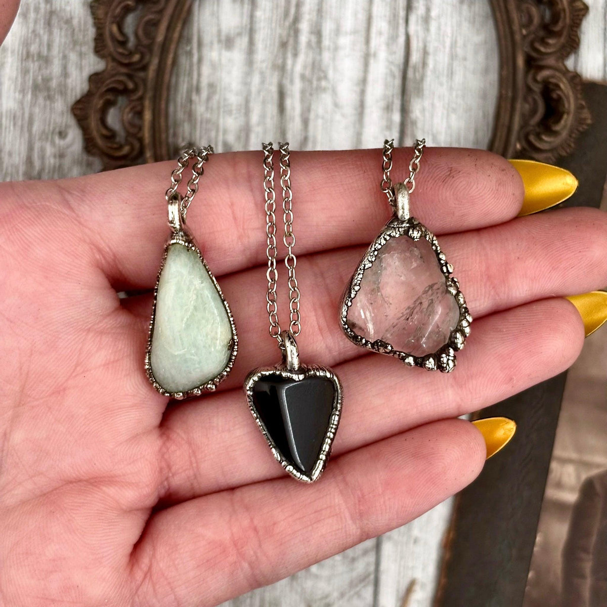 Dainty pebble necklace from FOXLARK with aquamarine, clear quartz, or black onyx in silver, featuring smooth gemstone pebbles.