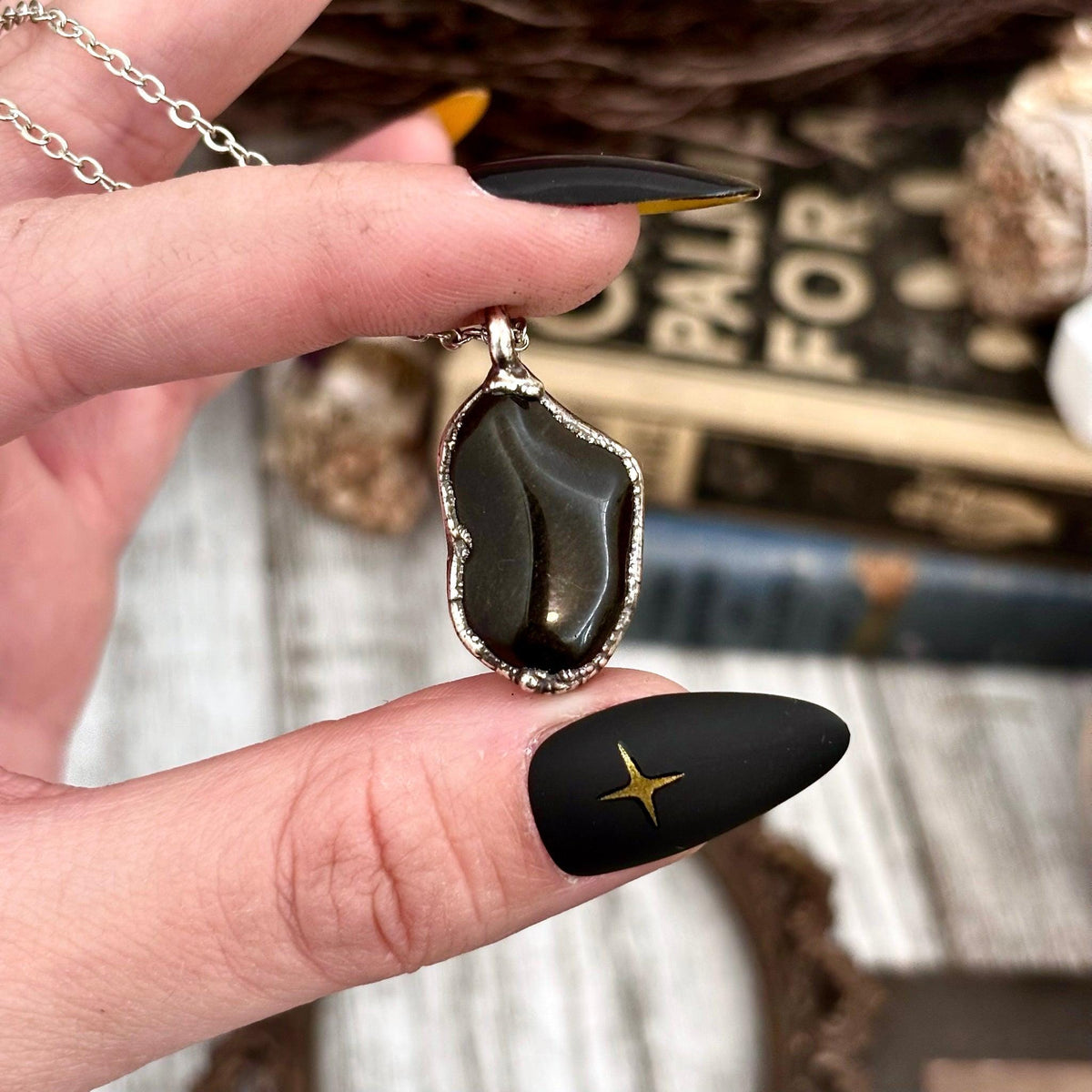 Dainty Foxlark Pebble Necklace featuring aquamarine, clear quartz, or black onyx in silver, showcasing smooth gemstone pendants.