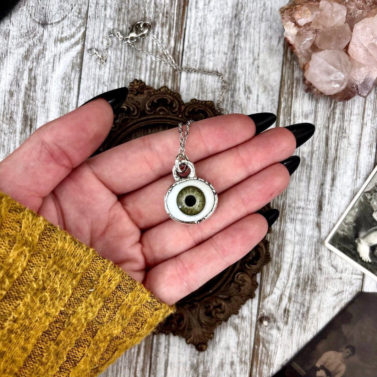 Green iris eye necklace by FOXLARK, fine silver jewelry featuring a detailed eye pendant from the Foxlark Collection.