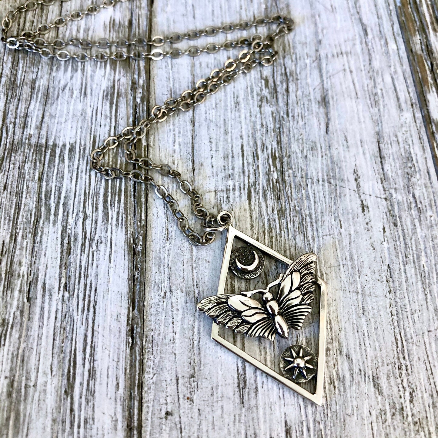 Tiny Talisman Collection - Sterling Silver Geometric Moth Necklace with Sun and Moon 32x21mm /.