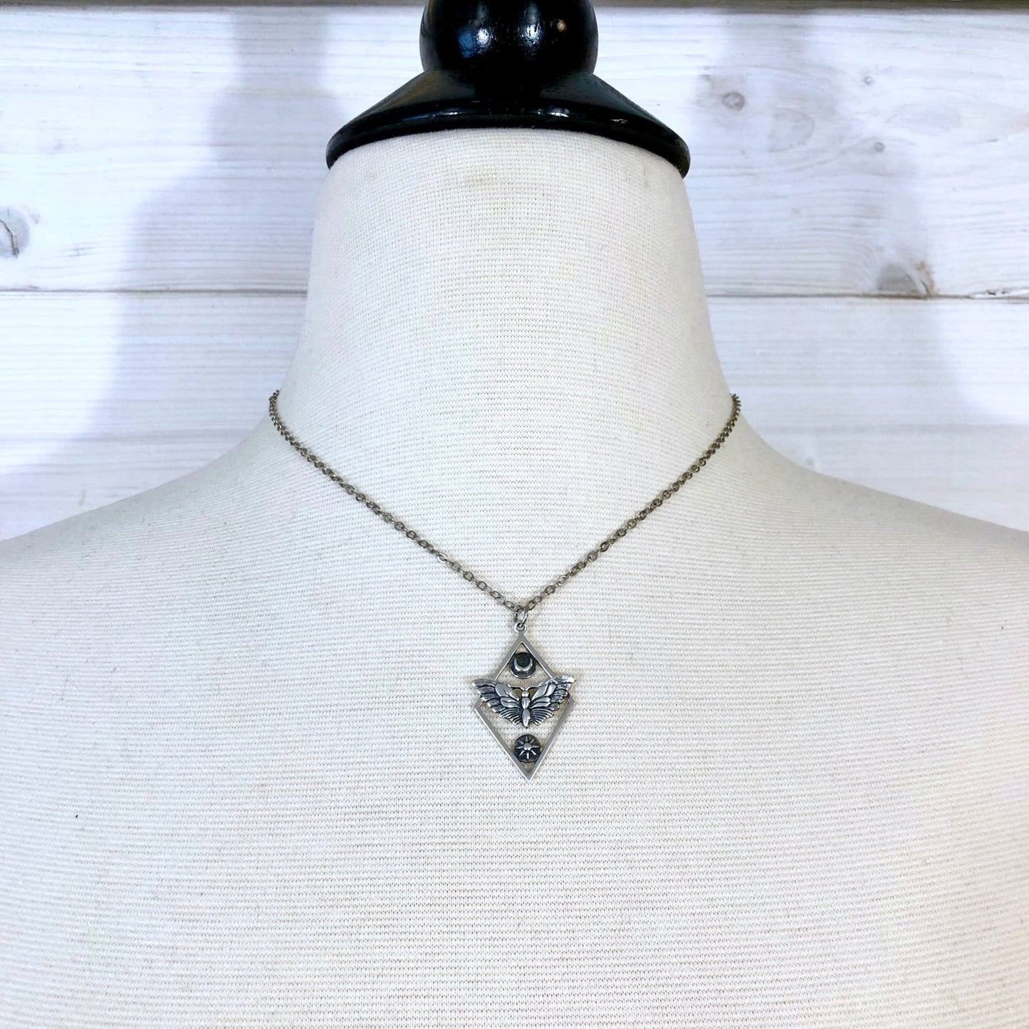 Tiny Talisman Collection - Sterling Silver Geometric Moth Necklace with Sun and Moon 32x21mm /.
