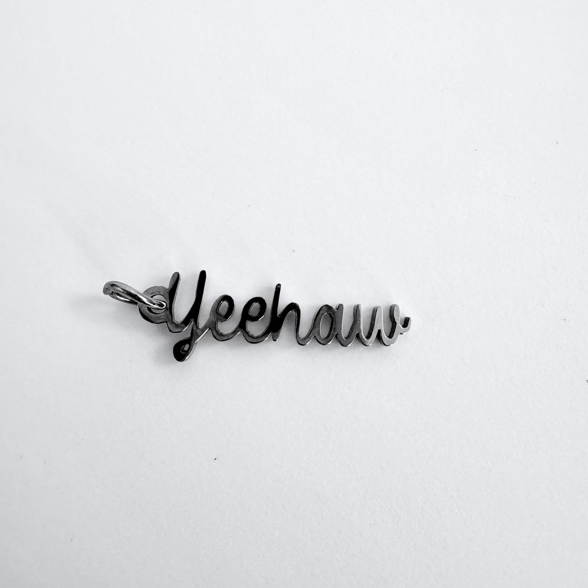 Yeehaw Charm stainless steel western pendant necklace from the Lucky Charm Bar at Foxlark