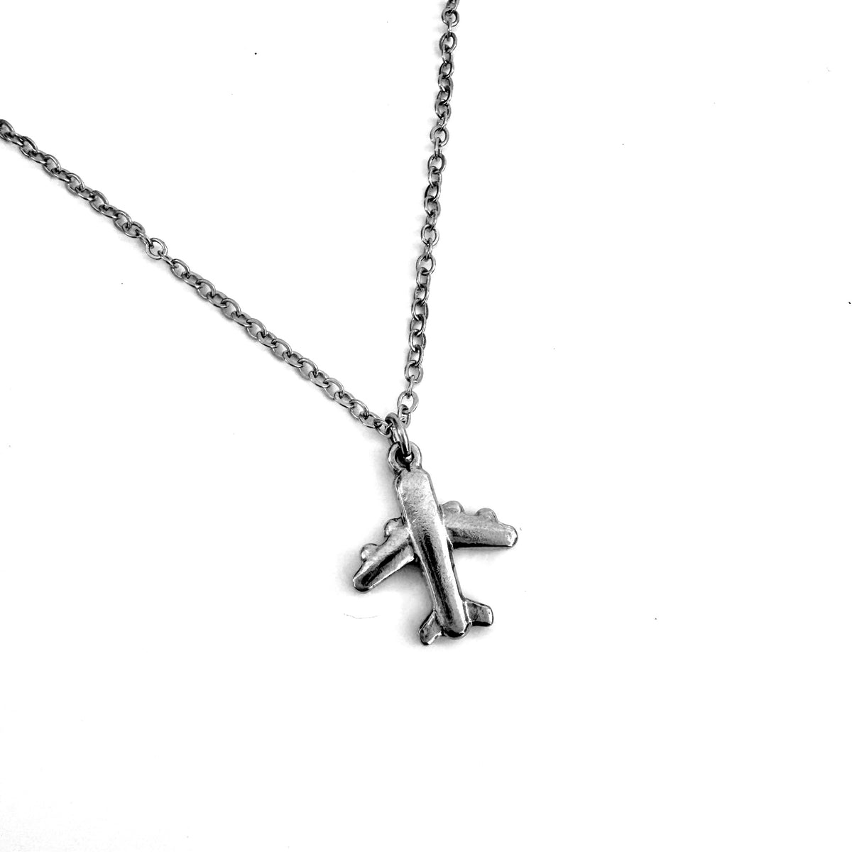 Airplane Charm stainless steel pendant necklace from the Lucky Charm Bar at Foxlark