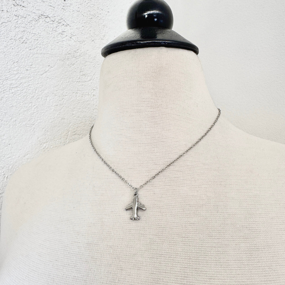 Airplane Charm stainless steel pendant necklace from the Lucky Charm Bar at Foxlark