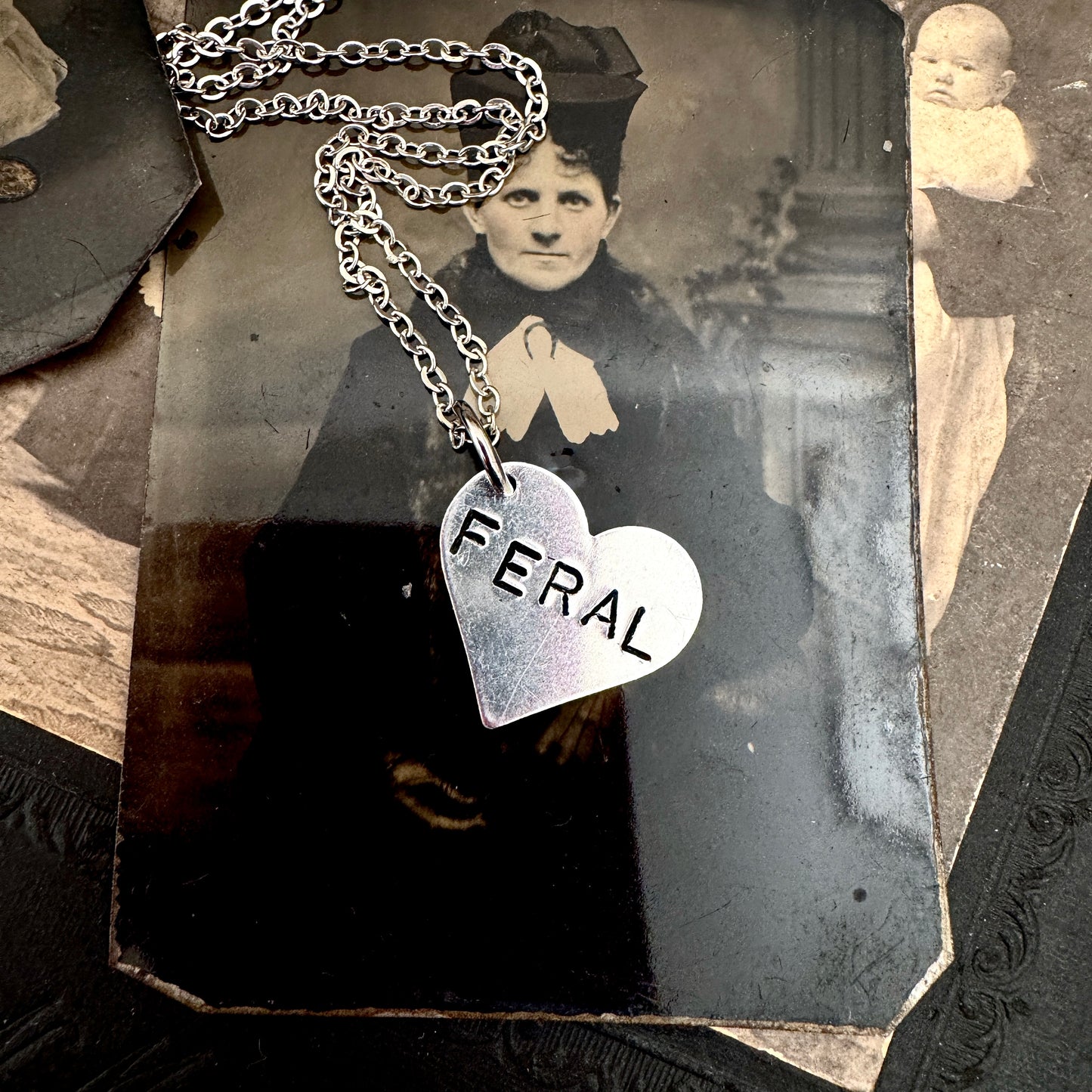 Hand Stamped FERAL Heart Necklace