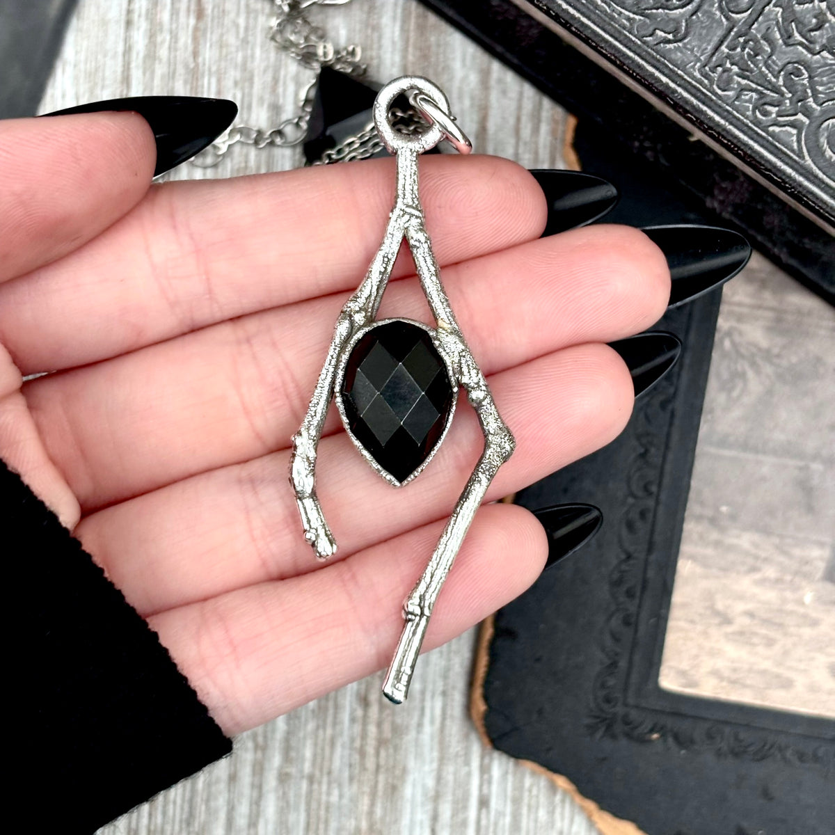 Black Onyx crystal necklace with silver sticks from FOXLARK's Sticks & Stones collection, featuring a sleek and elegant design.